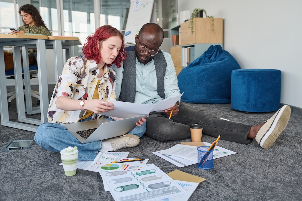 Businesswoman and her client discussing strategy