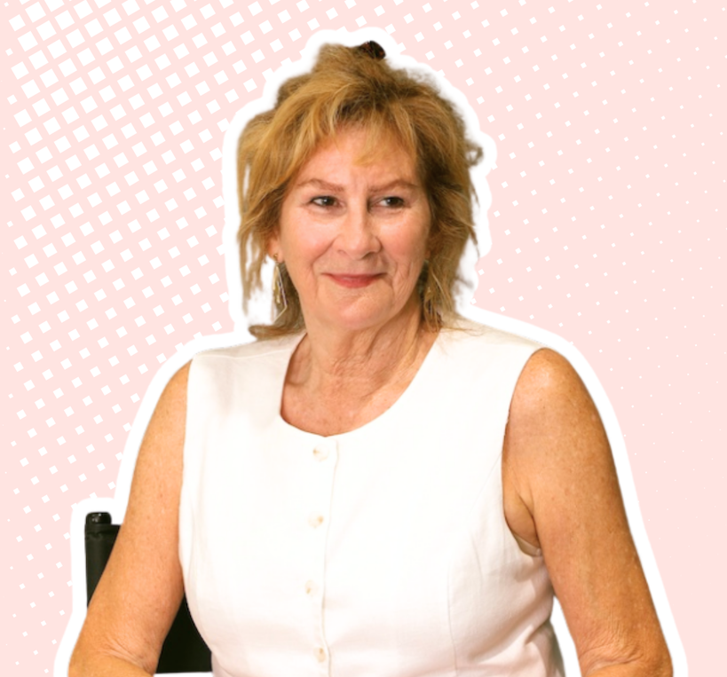 Maggie, CEO of Jumpstart Matrix, seated on csting chair during photoshoot